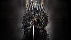 Ned stark sitting on the Iron Thorne.